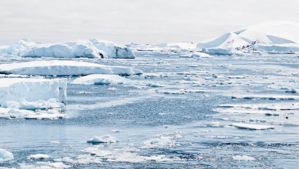 The climate crisis causes human rights issues. Image of broken glacial ice packs.